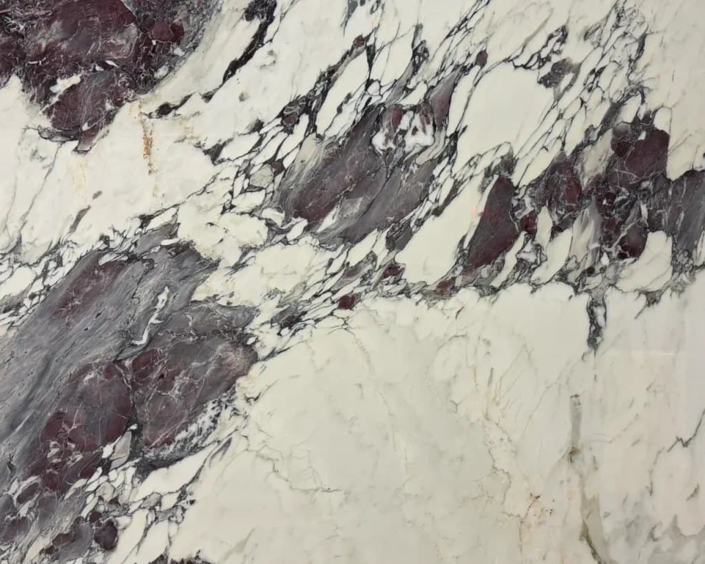 Breccia marble slab with deep burgundy veining